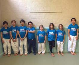 Red Belt Practicing in a Junior Judo Class