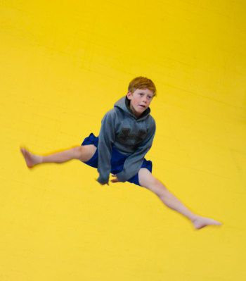 Young person jumping on the trampoline | Kids Parties | Circus Center