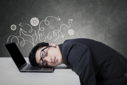 Man asleep at computer