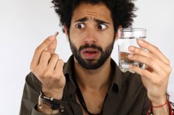 a-man-wondering-about-a-pill
